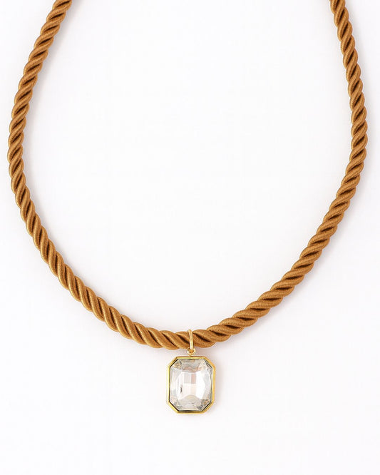 Necklace with a rope design and a rectangular pendant on a white background