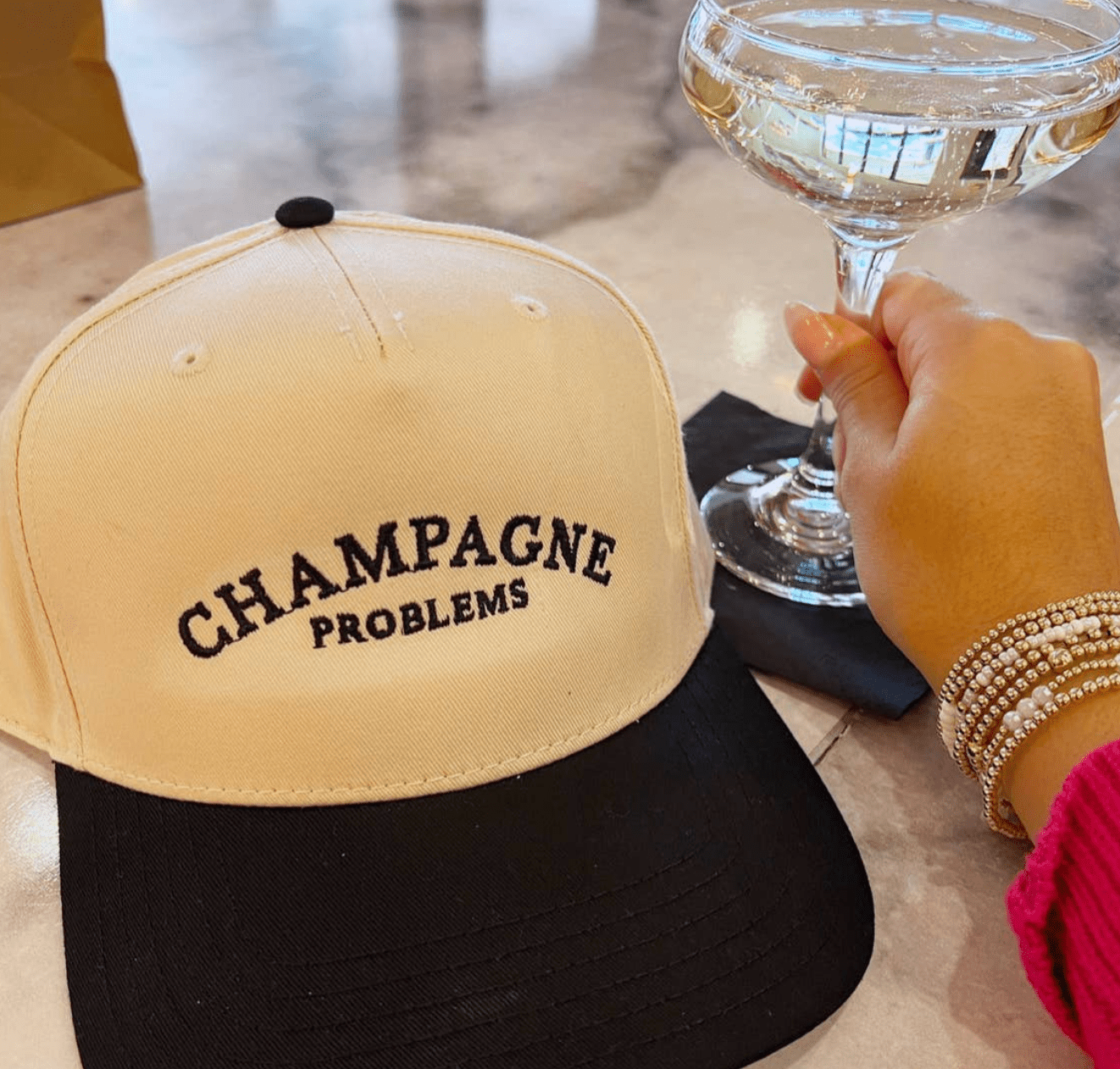 Champagne Problems - Black Vintage Trucker Hat - Shop LINNY CO