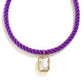 Purple braided hair tie with a clear crystal pendant on a white background
