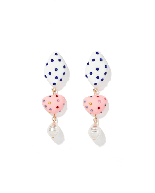 Pair of earrings with white teardrop-shaped beads, pink polka dot beads, and gold accents on a white background.