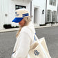 Booked and Busy - Royal Blue Vintage Trucker Hat - PREORDER - Shop LINNY CO