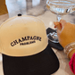 Champagne Problems - Black Vintage Trucker Hat - Shop LINNY CO