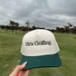 He's Golfing - Green Vintage Trucker Hat - Shop LINNY CO
