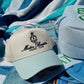 Motor Boatin' Yacht Club - Baby Blue Vintage Trucker Hat - Shop LINNY CO
